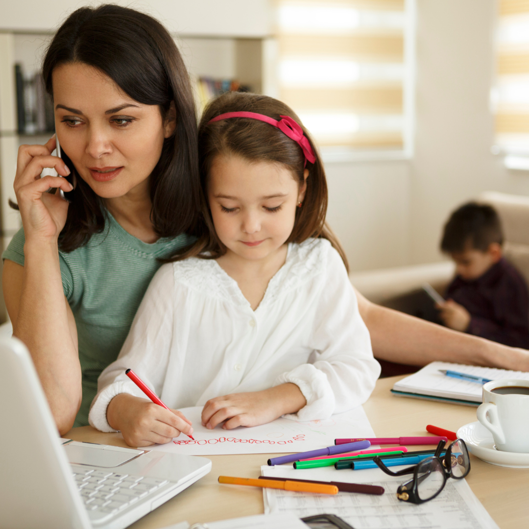 busy mom helping child with homework